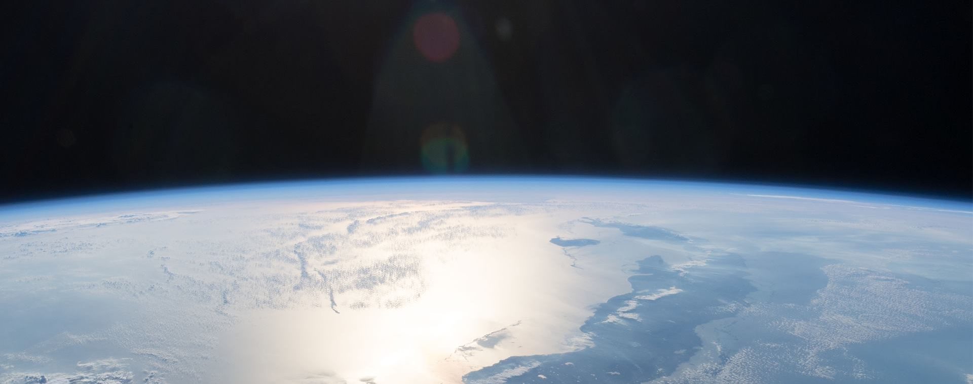 First Light for the PoET Solar Telescope: Observing the Sun to Enhance Exoplanet Research